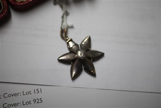 A Victorian gold, silver and diamond encrusted flower head pendant, pendant overall 1.5in.
